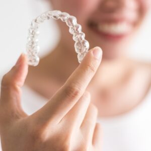 Patient wearing Invisalign in Fitzrovia during consultation